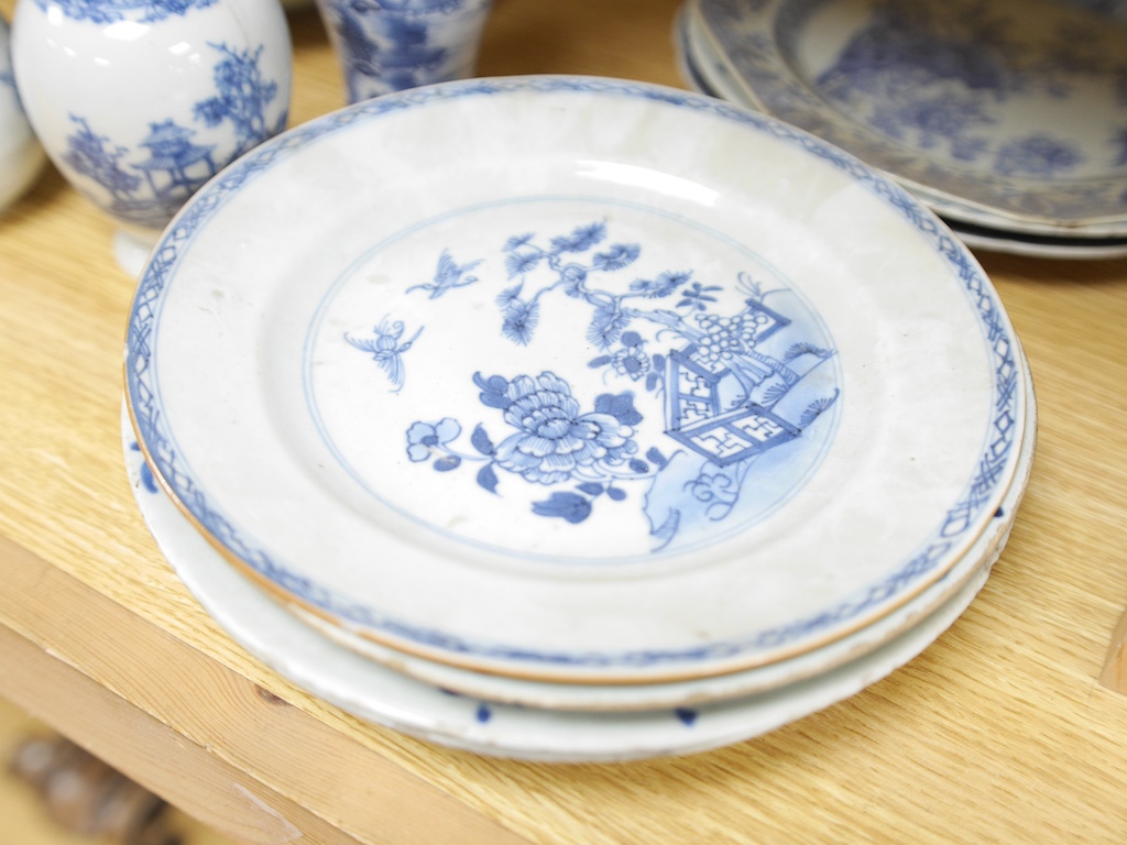 A group of 18th century Chinese export blue and white plates, two similar vases and a jug, largest 22cm wide. Condition - varies, some chipping and cracking